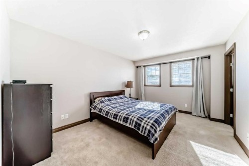 35 Tucker Circle, Okotoks, AB - Indoor Photo Showing Bedroom