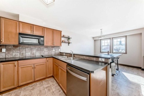 35 Tucker Circle, Okotoks, AB - Indoor Photo Showing Kitchen With Double Sink