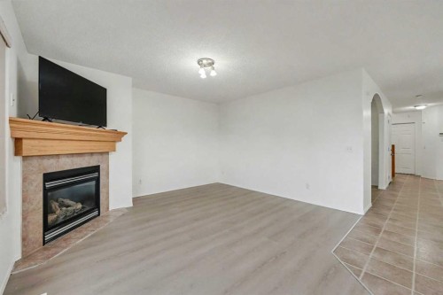 12 Tarawood Grove Ne, Calgary, AB - Indoor With Fireplace