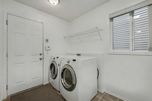 12 Tarawood Grove Ne, Calgary, AB - Indoor Photo Showing Laundry Room