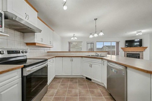12 Tarawood Grove Ne, Calgary, AB - Indoor Photo Showing Kitchen With Double Sink