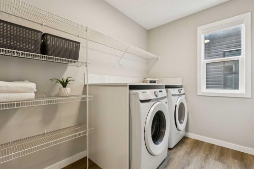 103 Saddlebred Link, Cochrane, AB - Indoor Photo Showing Laundry Room