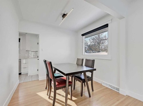 23 Cambrian Drive Nw, Calgary, AB - Indoor Photo Showing Dining Room