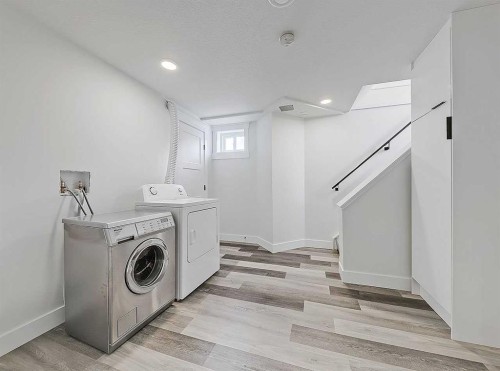 23 Cambrian Drive Nw, Calgary, AB - Indoor Photo Showing Laundry Room