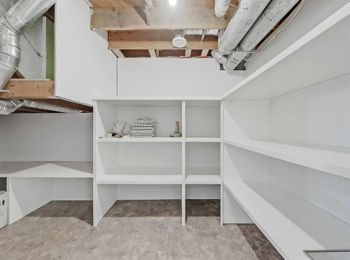 23 Cambrian Drive Nw, Calgary, AB - Indoor With Storage