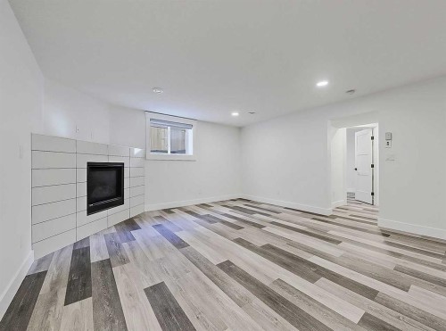 23 Cambrian Drive Nw, Calgary, AB - Indoor With Fireplace