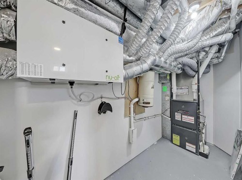 23 Cambrian Drive Nw, Calgary, AB - Indoor Photo Showing Basement