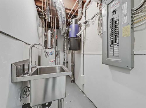 23 Cambrian Drive Nw, Calgary, AB - Indoor Photo Showing Basement