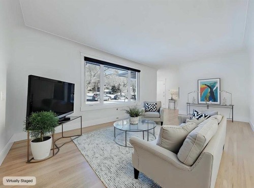 23 Cambrian Drive Nw, Calgary, AB - Indoor Photo Showing Living Room