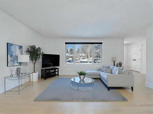 23 Cambrian Drive Nw, Calgary, AB - Indoor Photo Showing Living Room