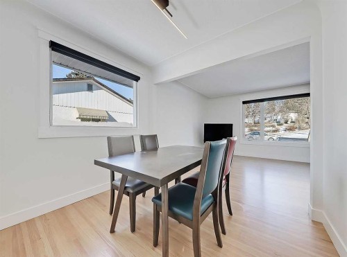 23 Cambrian Drive Nw, Calgary, AB - Indoor Photo Showing Dining Room