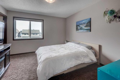 58 Elgin Meadows Gardens Se, Calgary, AB - Indoor Photo Showing Bedroom