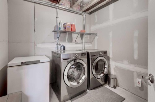 58 Elgin Meadows Gardens Se, Calgary, AB - Indoor Photo Showing Laundry Room