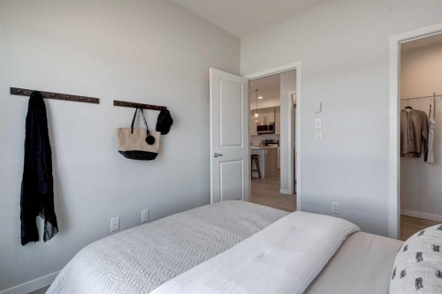2111-20295 Seton Way Se, Calgary, AB - Indoor Photo Showing Bedroom