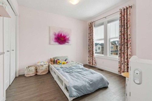 339 Fireside Place, Cochrane, AB - Indoor Photo Showing Bedroom