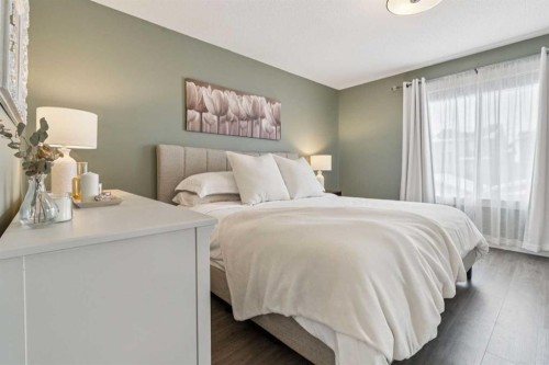 339 Fireside Place, Cochrane, AB - Indoor Photo Showing Bedroom