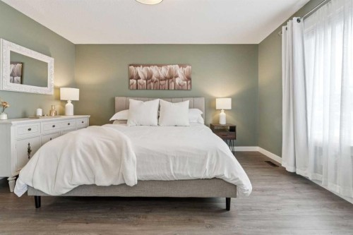 339 Fireside Place, Cochrane, AB - Indoor Photo Showing Bedroom