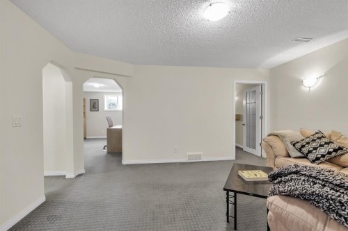 151 Hawkmere View, Chestermere, AB - Indoor Photo Showing Living Room