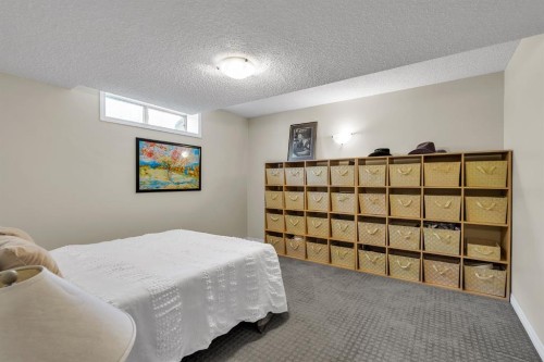 151 Hawkmere View, Chestermere, AB - Indoor Photo Showing Bedroom