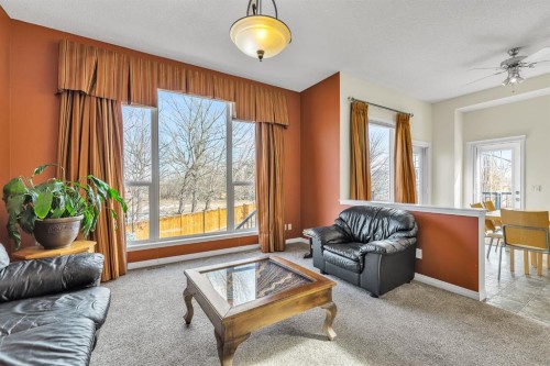 151 Hawkmere View, Chestermere, AB - Indoor Photo Showing Living Room