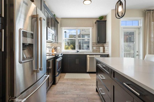 263 Mahogany Way Se, Calgary, AB - Indoor Photo Showing Kitchen With Upgraded Kitchen