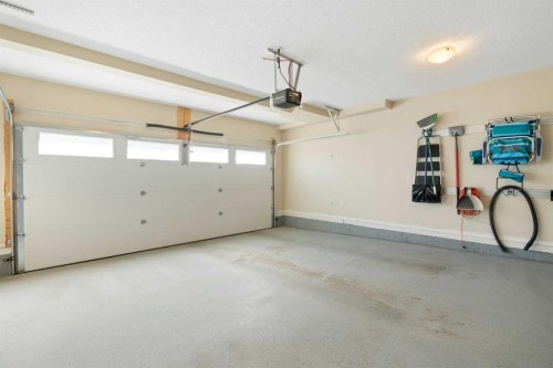 263 Mahogany Way Se, Calgary, AB - Indoor Photo Showing Garage