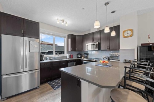78 Livingston Gate Ne, Calgary, AB - Indoor Photo Showing Kitchen With Stainless Steel Kitchen With Upgraded Kitchen
