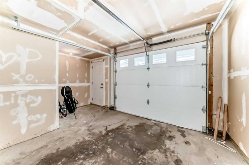 5 Redstone Circle Ne, Calgary, AB - Indoor Photo Showing Garage