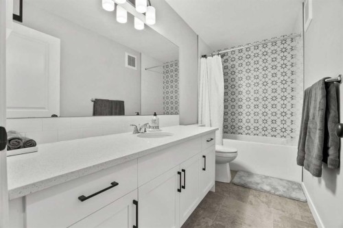 335 Sheep River Place, Okotoks, AB - Indoor Photo Showing Bathroom