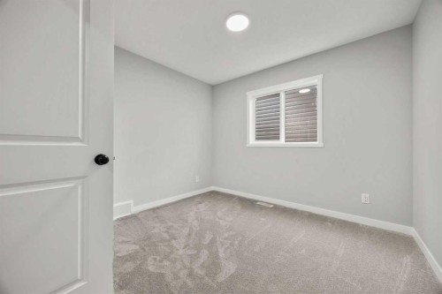 335 Sheep River Place, Okotoks, AB - Indoor Photo Showing Other Room