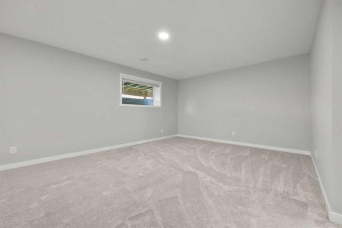 335 Sheep River Place, Okotoks, AB - Indoor Photo Showing Other Room