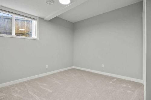 335 Sheep River Place, Okotoks, AB - Indoor Photo Showing Other Room
