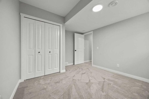 335 Sheep River Place, Okotoks, AB - Indoor Photo Showing Other Room