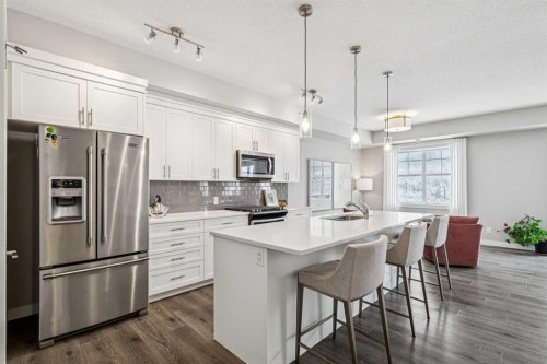 718 Cranbrook Walk Se, Calgary, AB - Indoor Photo Showing Kitchen With Stainless Steel Kitchen With Upgraded Kitchen