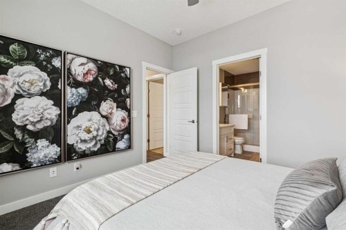 718 Cranbrook Walk Se, Calgary, AB - Indoor Photo Showing Bedroom