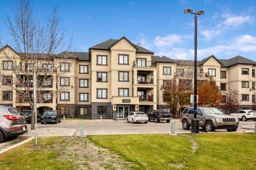 2202-310 Mckenzie Towne Gate Se, Calgary, AB - Outdoor With Balcony With Facade