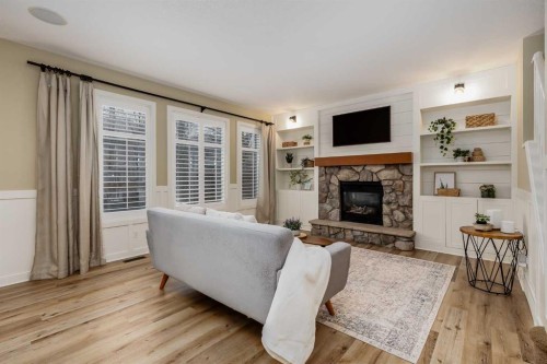 153 Cranridge Terrace Se, Calgary, AB - Indoor Photo Showing Living Room With Fireplace
