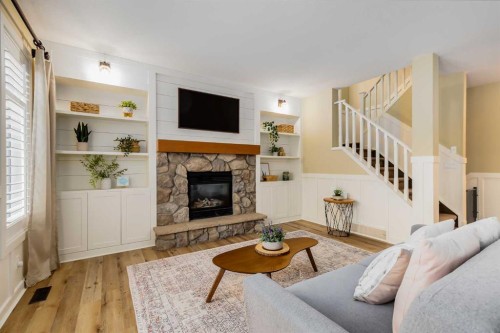 153 Cranridge Terrace Se, Calgary, AB - Indoor Photo Showing Living Room With Fireplace