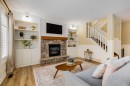 153 Cranridge Terrace Se, Calgary, AB  - Indoor Photo Showing Living Room With Fireplace 