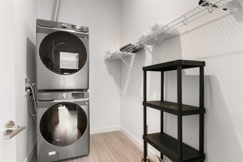 1803-730 2 Avenue Sw, Calgary, AB - Indoor Photo Showing Laundry Room