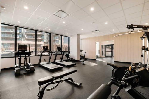 1803-730 2 Avenue Sw, Calgary, AB - Indoor Photo Showing Gym Room