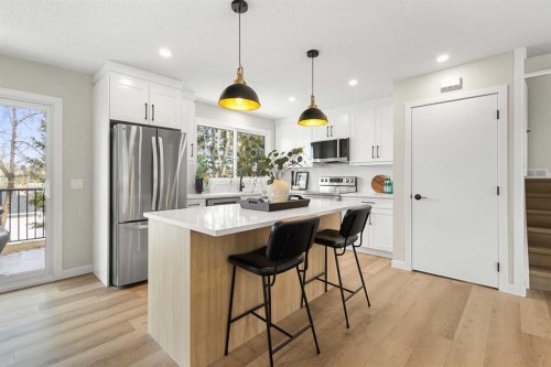 347 Queensland Drive Se, Calgary, AB - Indoor Photo Showing Kitchen With Stainless Steel Kitchen With Upgraded Kitchen