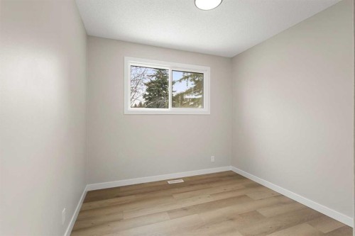 347 Queensland Drive Se, Calgary, AB - Indoor Photo Showing Other Room