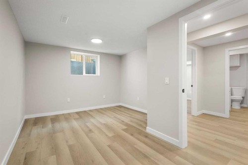 347 Queensland Drive Se, Calgary, AB - Indoor Photo Showing Other Room