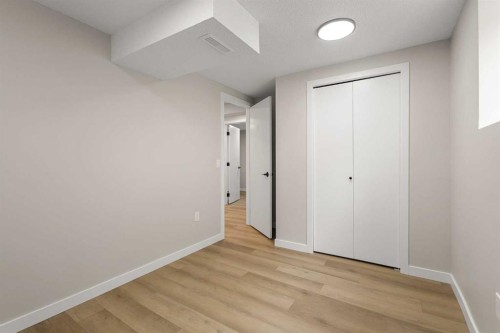 347 Queensland Drive Se, Calgary, AB - Indoor Photo Showing Other Room