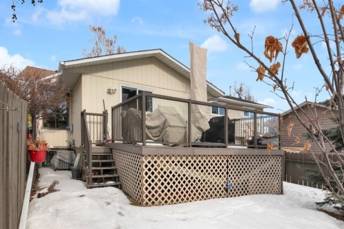 15 Coach Manor Rise Sw, Calgary, AB - Outdoor With Deck Patio Veranda
