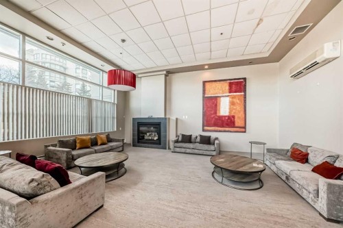 306-1121 6 Avenue Sw, Calgary, AB - Indoor With Fireplace