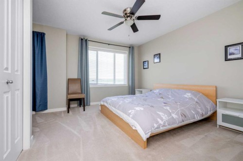100 Copperstone Villas Se, Calgary, AB - Indoor Photo Showing Bedroom