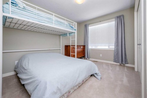 100 Copperstone Villas Se, Calgary, AB - Indoor Photo Showing Bedroom