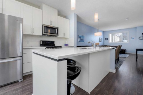 100 Copperstone Villas Se, Calgary, AB - Indoor Photo Showing Kitchen With Upgraded Kitchen